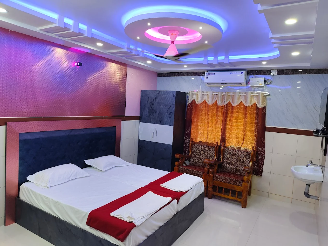 Double bedroom with decorative headboard